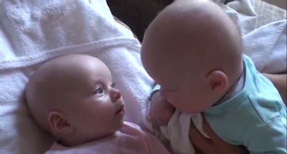baby twins have amazing connection