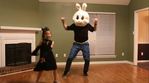 this dad and daughter are adorable dance partners